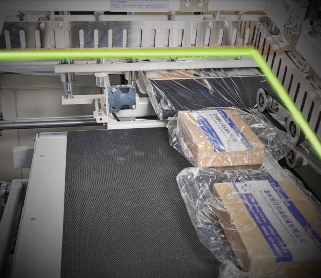 เครื่องตัดฟลีม อบฟลีมยืดหด อัตโนมัติ 